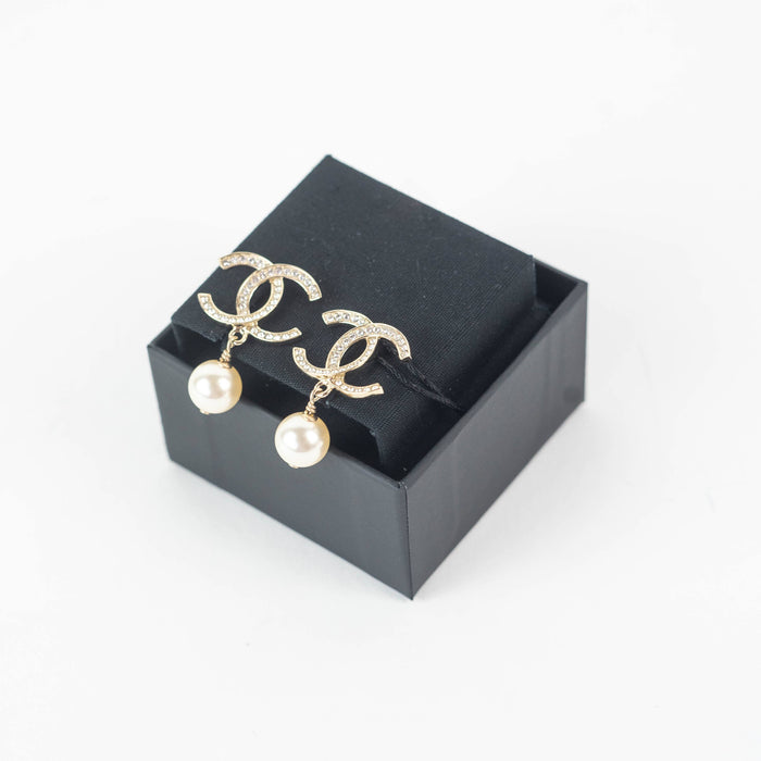 Chanel CC Dangling Golden Pearl Earrings