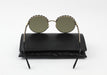 Chanel Black and Gold Round Sunglasses